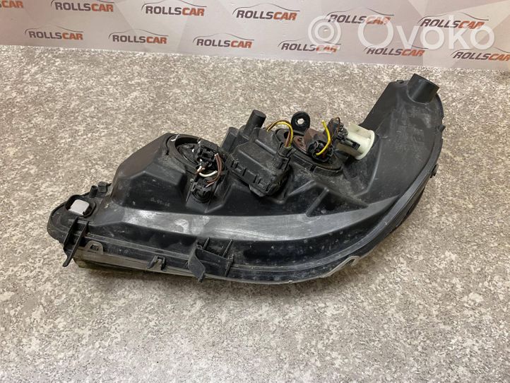 Opel Zafira A Lampa przednia 89100055