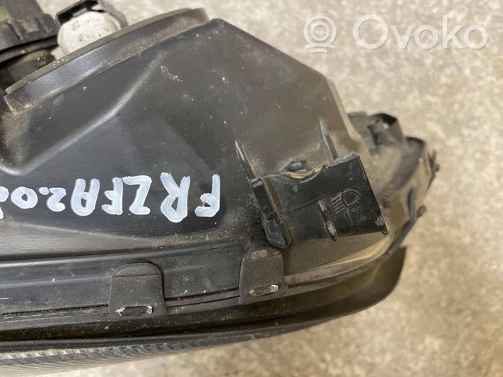 Opel Zafira A Lampa przednia 89100055