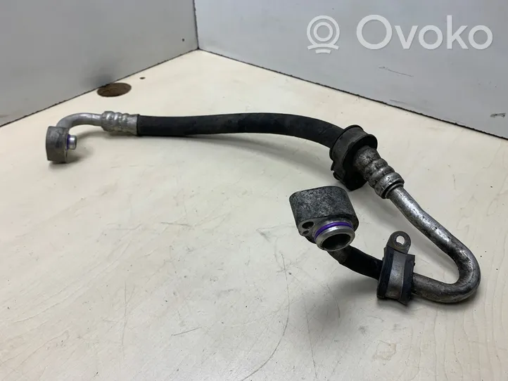 Volkswagen PASSAT B5.5 Air conditioning (A/C) pipe/hose 1K0260704D