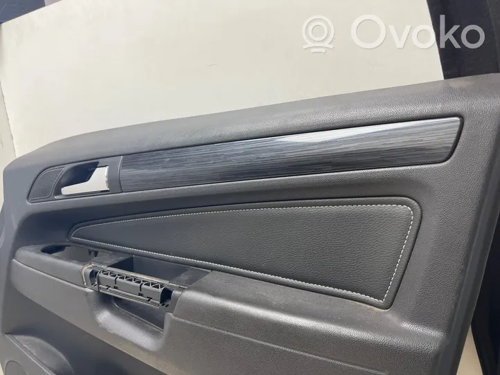 Opel Zafira B Revestimiento de puerta delantera 13189257