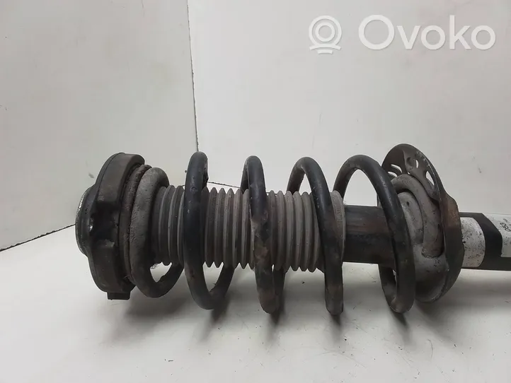 Volkswagen Touran I Front shock absorber with coil spring 36E91A