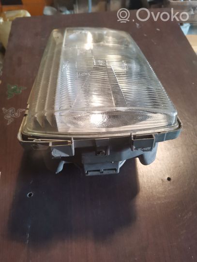 Mercedes-Benz 200 300 W123 Lampa przednia 1305235039L