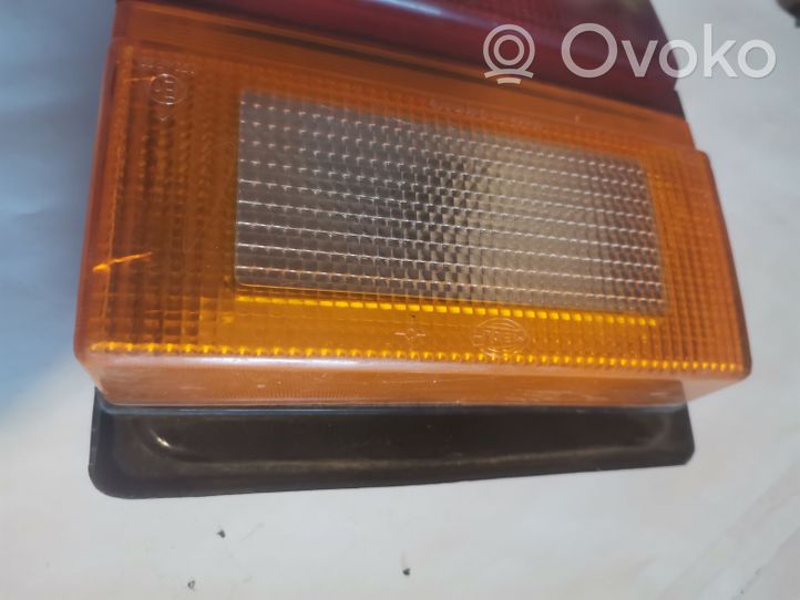 Audi 200 Lampy tylnej klapy bagażnika 443945226