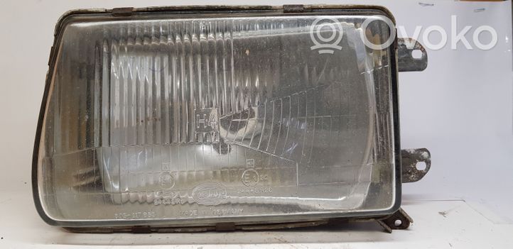 Audi 100 200 5000 C2 Headlight/headlamp 303117853