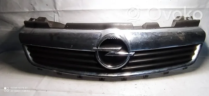 Opel Zafira B Grille calandre supérieure de pare-chocs avant 13157590