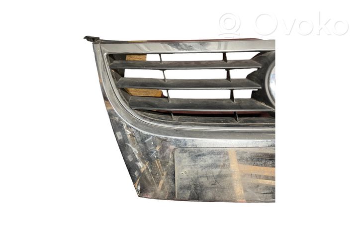 Volkswagen Touran I Grille calandre supérieure de pare-chocs avant 1T0853651D