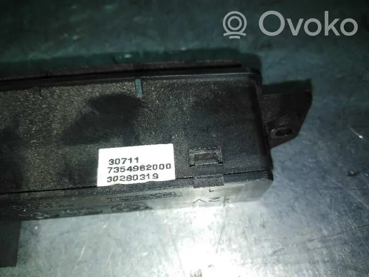 Fiat Doblo Botón interruptor de luz de peligro 7354982000