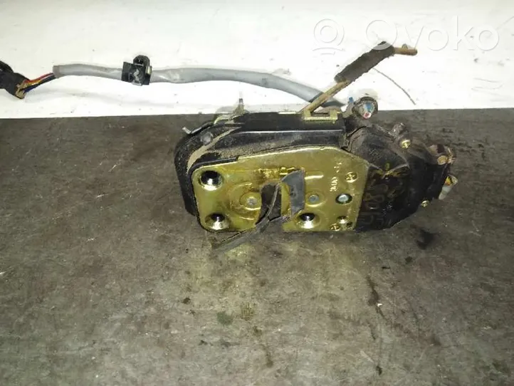 KIA Carens I Etuoven lukko 0K2FA58310