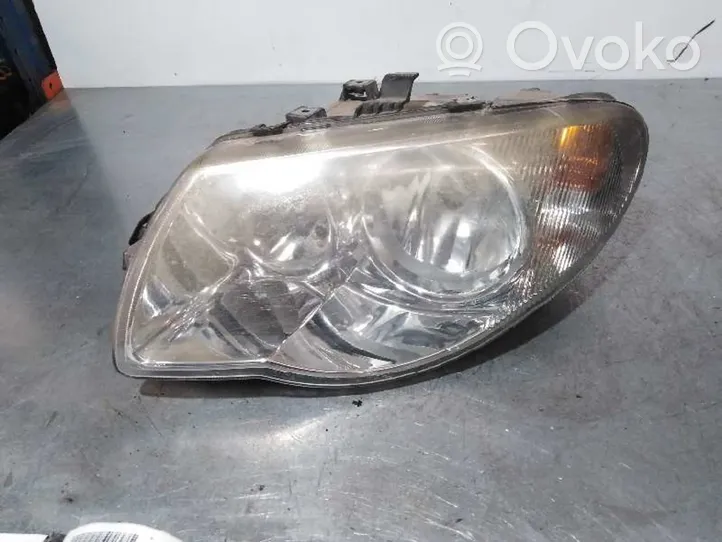 Chrysler Voyager Lampa przednia 04857831AC