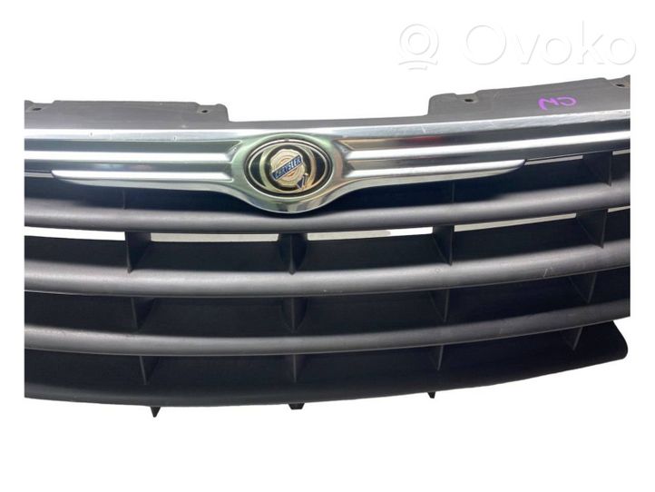 Chrysler Voyager Front bumper upper radiator grill 04857960AA