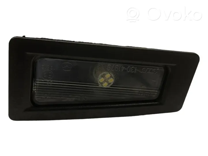 Mazda CX-3 Lampa oświetlenia tylnej tablicy rejestracyjnej 1041979
