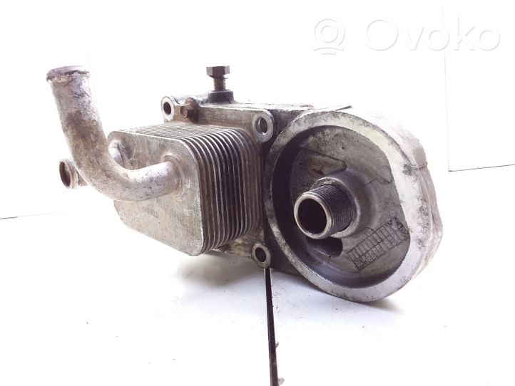 Ford Focus Mocowanie / uchwyt filtra oleju YS6Q6A642BA