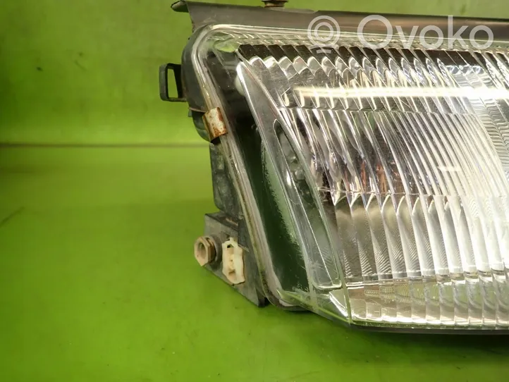 Volkswagen PASSAT B5 Lampa przednia 06-441-1125R