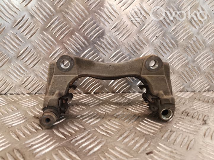 Toyota Corolla Verso E121 Plaquette / support d'étrier avant Y01336