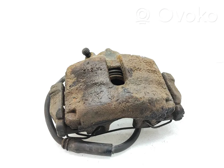 Volkswagen PASSAT B7 Front brake caliper 