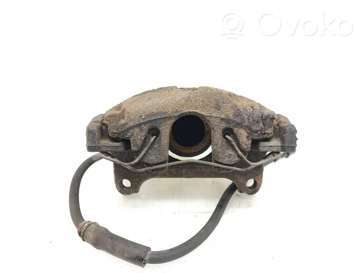 Volkswagen PASSAT B7 Front brake caliper 