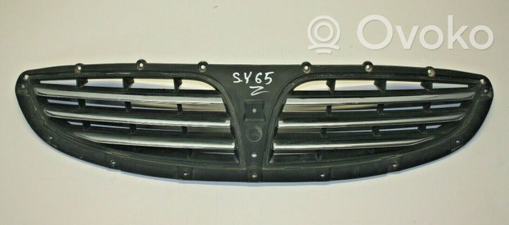 SsangYong Kyron Grille calandre supérieure de pare-chocs avant 7945109000