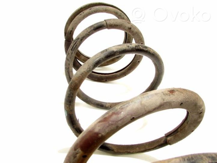 KIA Carens I Front coil spring 