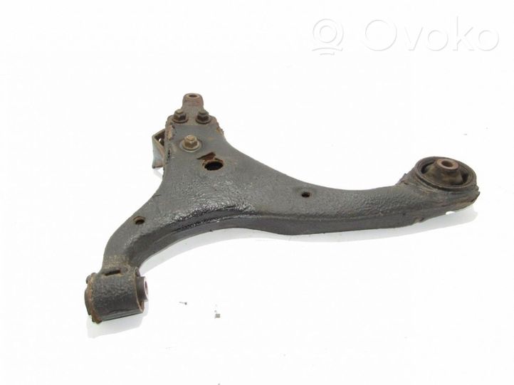 KIA Carens II Front lower control arm/wishbone 