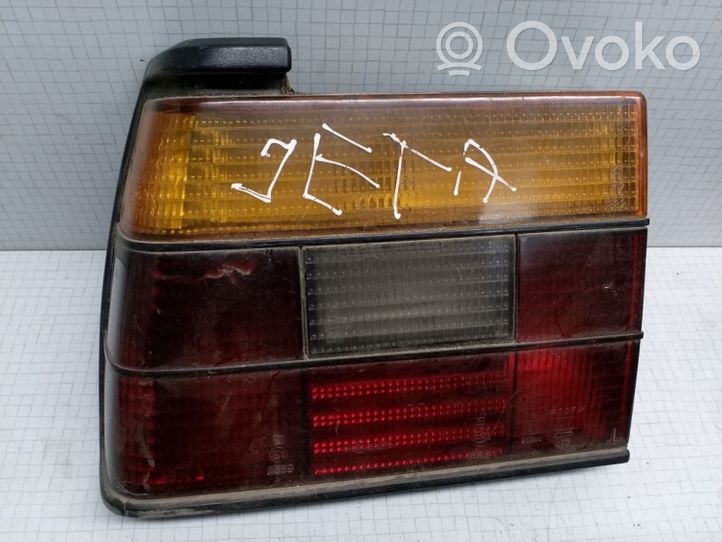 Volkswagen Jetta II Aizmugurējais lukturis virsbūvē 165945111B