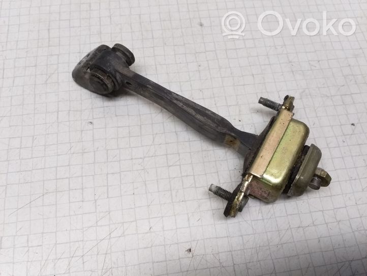 Ford Mondeo Mk III Türfangband Türfeststeller Türstopper vorne 