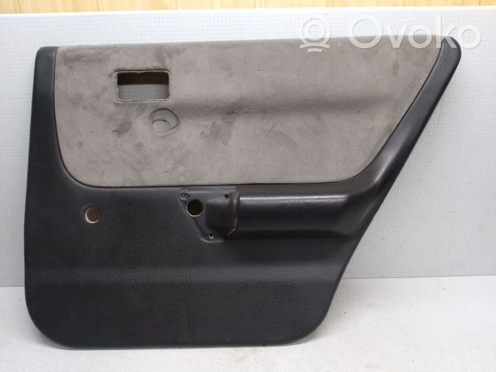 Mazda 323 F Rivestimento del pannello della portiera posteriore 6AB48168520C