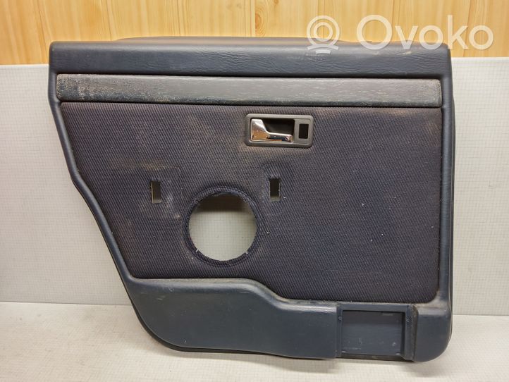 Audi 100 200 5000 C3 Garniture panneau de porte arrière 443867305