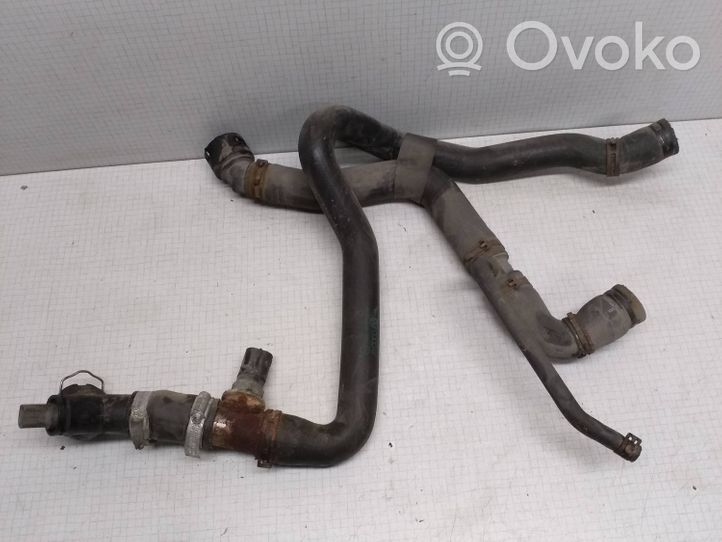 Volkswagen Golf V Engine coolant pipe/hose 1K0121049AM