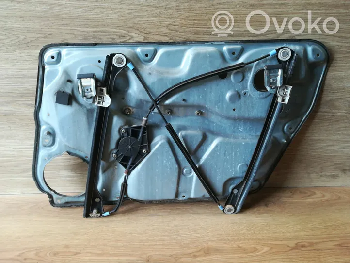 Volkswagen PASSAT B5.5 Front door window regulator with motor 3B4837751LD