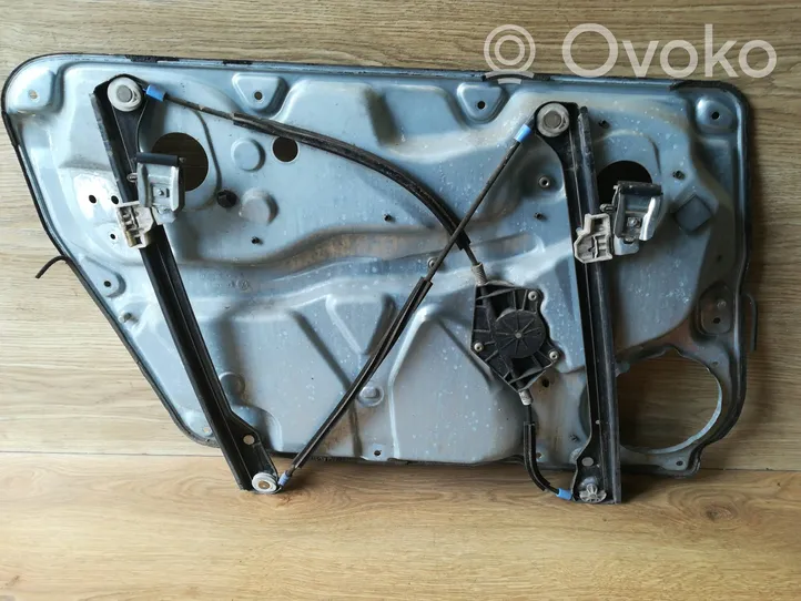 Volkswagen PASSAT B5.5 Front door window regulator with motor 3B4837756D