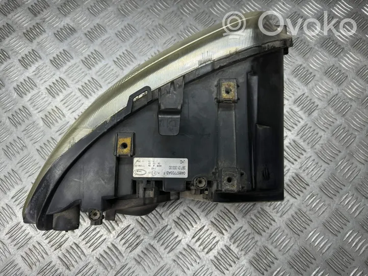 Chrysler Voyager Lampa przednia 04857703AB