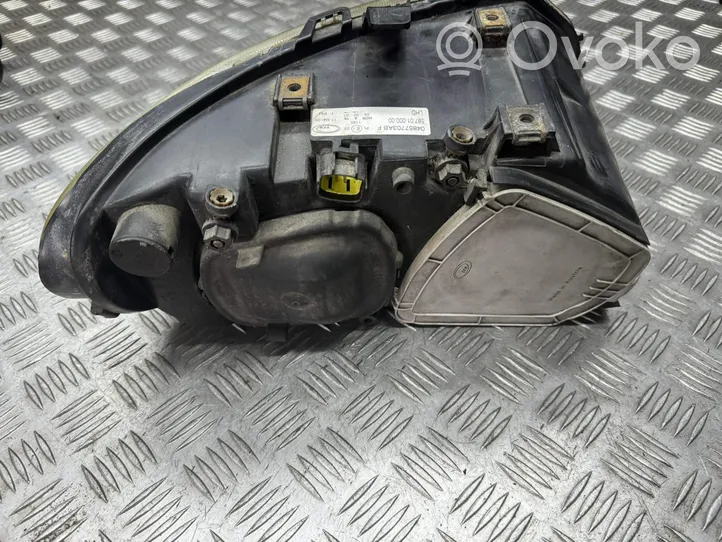 Chrysler Voyager Lampa przednia 04857703AB