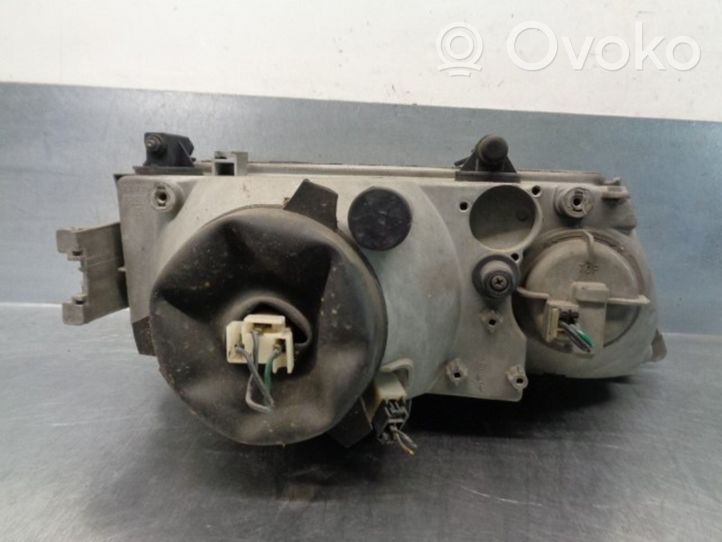 Lancia Dedra Phare frontale 82457952