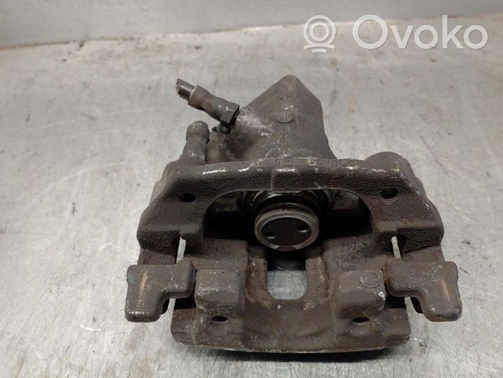 Ford Focus Supporto della pinza del freno posteriore 2080513