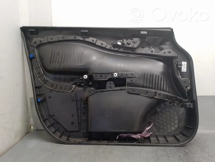 Opel Corsa E Rivestimento del pannello della portiera anteriore 464275993