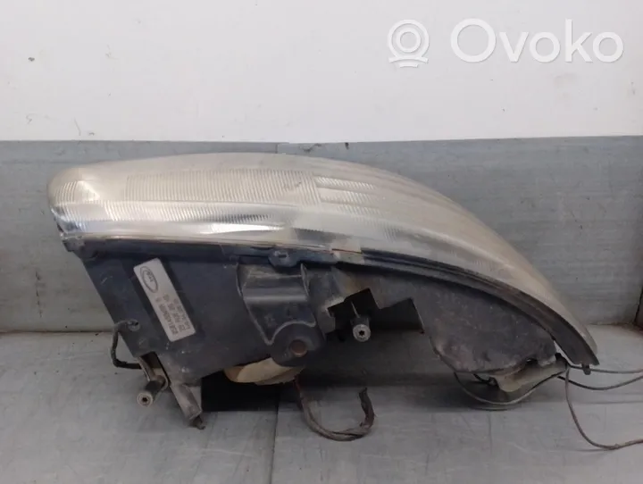 Chrysler Grand Voyager II Lampa przednia 05014534AA