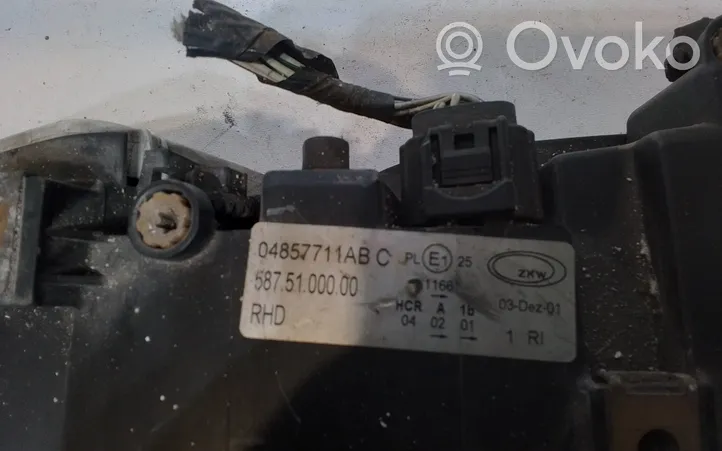 Chrysler Voyager Lampa przednia 04857711AB