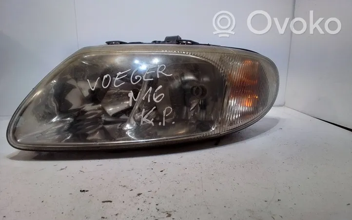 Chrysler Voyager Lampa przednia 04857711AB