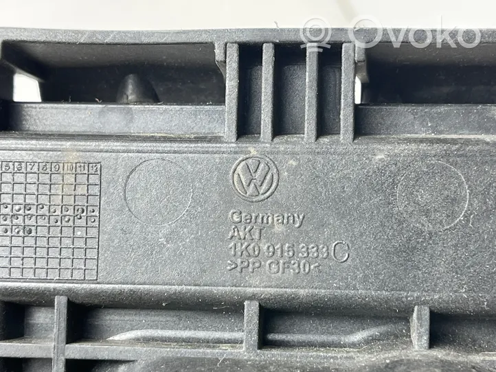 Volkswagen Touran I Support boîte de batterie 1K0915333