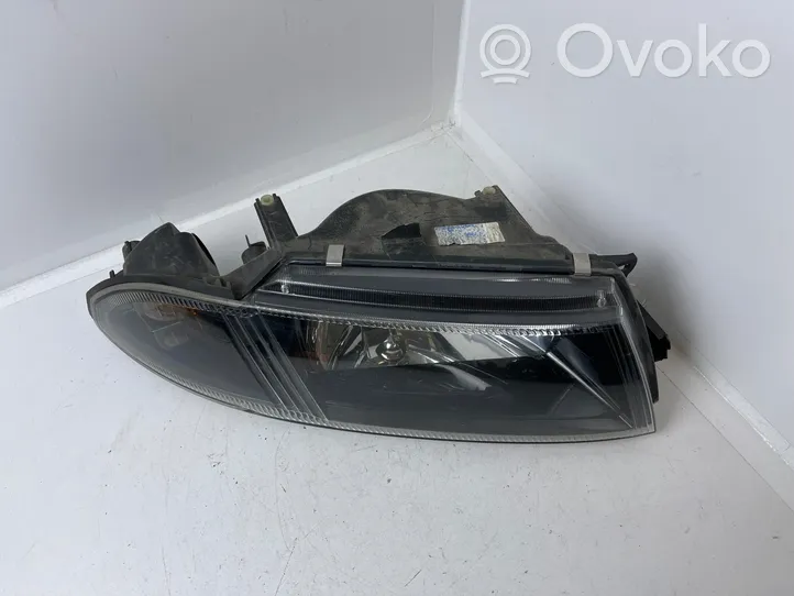 Mitsubishi Carisma Headlight/headlamp 15157800