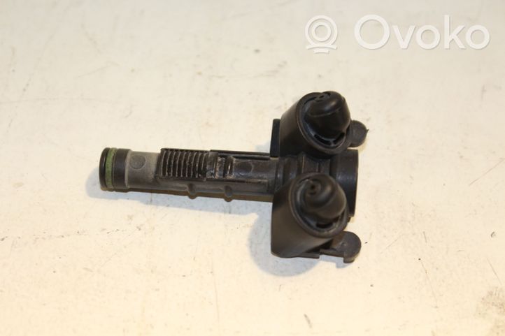 Volkswagen Tiguan Headlight washer spray nozzle 130860009