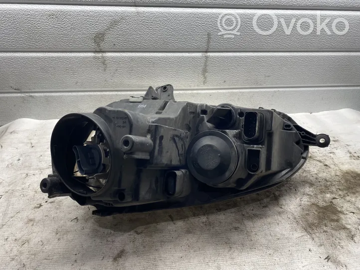 Volkswagen Golf V Lampa przednia 1K6941006Q