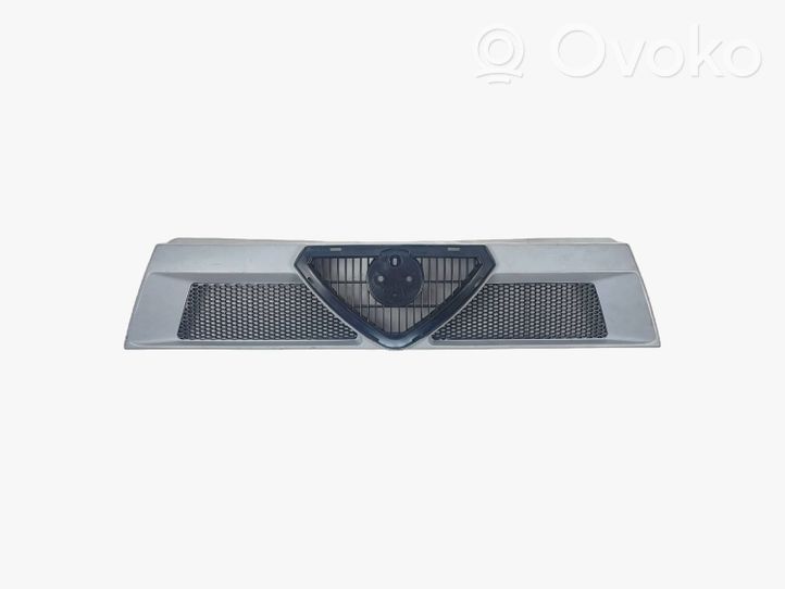 Alfa Romeo 75 Maskownica / Grill / Atrapa górna chłodnicy 1122660