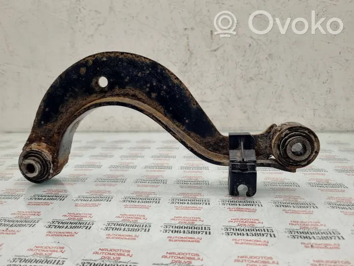 Volkswagen PASSAT B6 Braccio di controllo sospensione posteriore superiore/braccio oscillante 1K0505323N