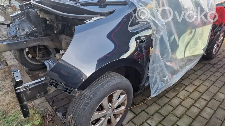 KIA Rio Błotnik przedni 