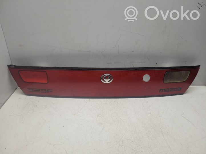 Mazda 323 F Takaluukun rekisterikilven valon palkki 0431441