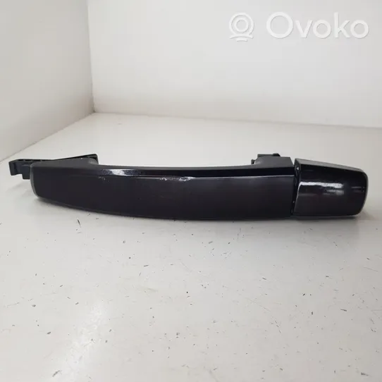 Opel Zafira C Front door exterior handle 13500026