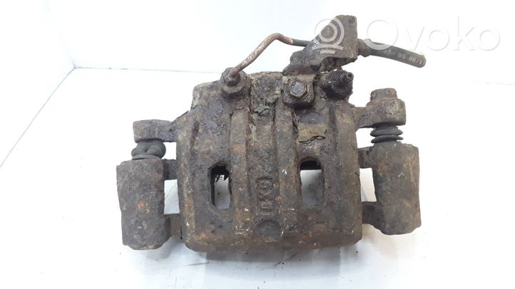 Mitsubishi Pajero Sport I Front brake caliper 