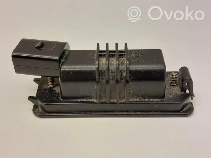 Volkswagen Eos Lampa oświetlenia tylnej tablicy rejestracyjnej 1J6943021B