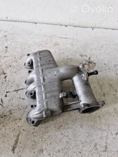 Volkswagen Golf IV Intake manifold 038129713J